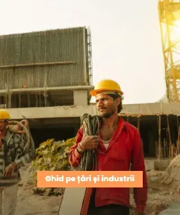 Muncitori din Asia pe un șantier de construcții, ilustrând alegerea țării de recrutare în funcție de industrie